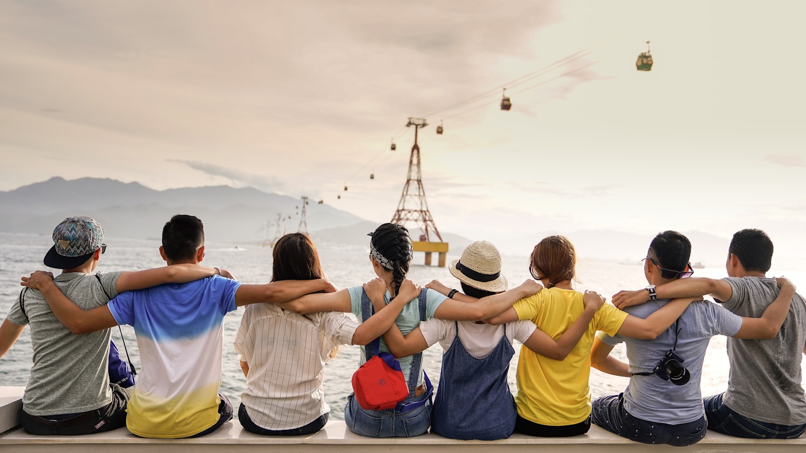 Families and friends gathered together outdoors.